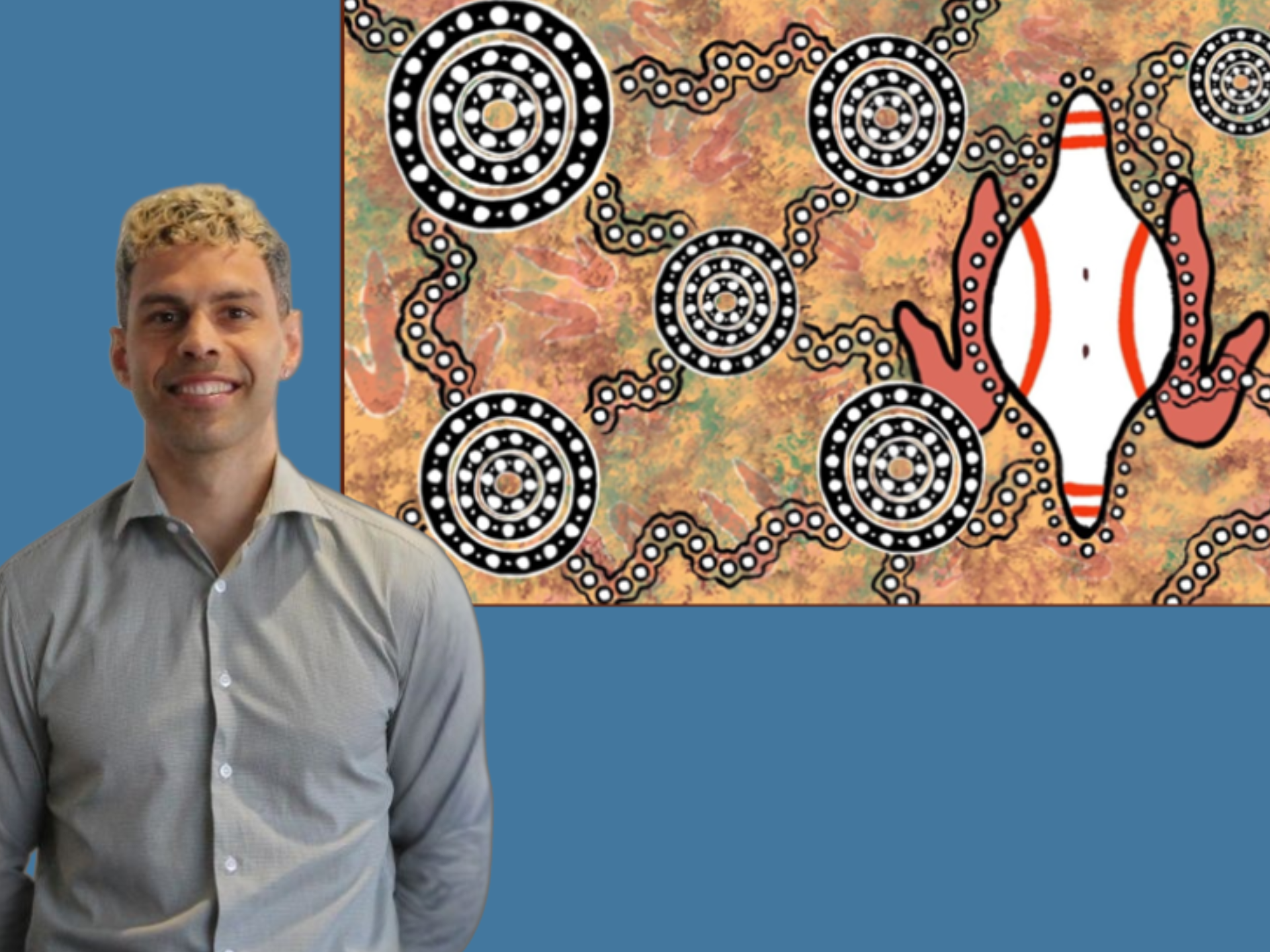 Photo of Matthew Rankine with his artwork Tarndanyangga – Keep the Fire Burning! Blak, Loud and Proud